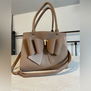 Brown bow purse